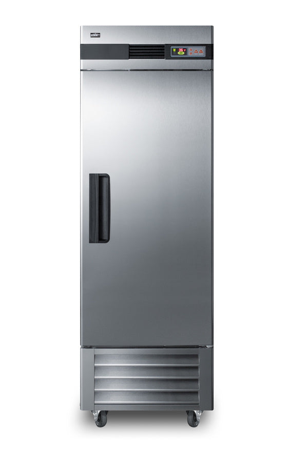 A tall, stainless steel reach-in refrigerator stands on four wheels. It has a single solid door with a black handle on the left, a vented section at the bottom, and a small digital control panel on the top right above the door.
