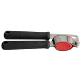 A TableCraft garlic press features black, textured handles and a red, perforated pressing plate. The stainless steel tool is shown on a white background with parallel handles in the closed position.