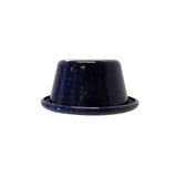 A small, dark blue Enamelware ramekin with white speckles, shown upside down on a white background. The 2 oz. cup is round with a flared rim, and its glossy porcelain enamel surface reflects the light.
