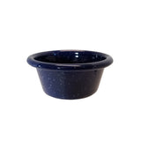 A small, round, deep blue enamelware ramekin with a wide rim and white speckles throughout, shown against a plain white background. This 4 oz bowl features a glossy porcelain enamel finish that gives it a beautiful reflective surface.