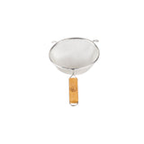 A metal mesh strainer with a round bowl, double fine mesh, and a wooden handle. Two small metal hooks on the rim provide stability when placed over a bowl or pot. The background is plain white.