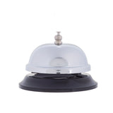 A shiny TableCraft chrome plated call bell with a round top and button sits on a black plastic base. The bell is centered against a plain white background, its reflective surface catching the light.