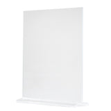 A clear acrylic menu holder stands vertically on a white background. It features a transparent rectangular frame with a wide, sturdy base, designed to display printed information or signs securely in an upright position. Made in USA.