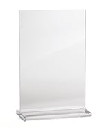A clear, upright acrylic menu holder with a glossy, transparent finish and solid flat base. Made in USA, this rectangular holder stands empty against a plain white background, ready to display your signs or menus.