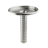A stainless steel drain cover from TableCraft, featuring a flat, round top and a cylindrical, perforated strainer tube—much like an infuser—lets water pass through while catching debris.