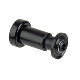A black, cylindrical mechanical part with flanges on both ends. One end has a wider, flat rim; the other features a tapered, grooved section with a central opening. Made in USA, this part may be metal or hard plastic.