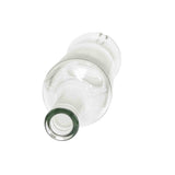 A clear, empty oil & vinegar bottle is pictured lying on its side atop a white background. The mouth of the glass bottle faces the viewer, showing its circular opening, while the rest gradually blurs into the background.