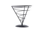 A black powder coated metal spiral cone stand from the Vertigo Collection with a circular base. The wide top narrows to form an appetizer cone shape, supported by wire spirals, and is displayed empty against a plain white background.