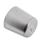 A brushed stainless steel Fry Cup lies on its side with the open end facing left. A white barcode sticker with black text and numbers is attached to the base. The plain white background highlights its metallic surface and subtle reflections.