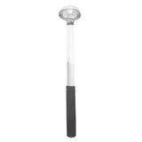 A stainless steel ladle with a deep, round bowl and a long handle featuring a black, textured grip at the end. This dishwasher safe ladle is positioned vertically against a plain white background.