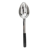 A stainless steel slotted serving spoon with an oval-shaped bowl and two elongated slots. The handle is metallic with a black, non-slip grip at the end. The spoon is photographed on a plain white background.