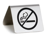 A stainless steel buffet tent sign displays a bold no smoking symbol—a black cigarette with smoke crossed out—clearly indicating that smoking is not allowed.