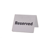 A stainless steel, tent-style reserved sign with bold black lettering is displayed on a white background. The sign is angled, showing both the front and part of the side, ideal for buffet tent or table reservations.