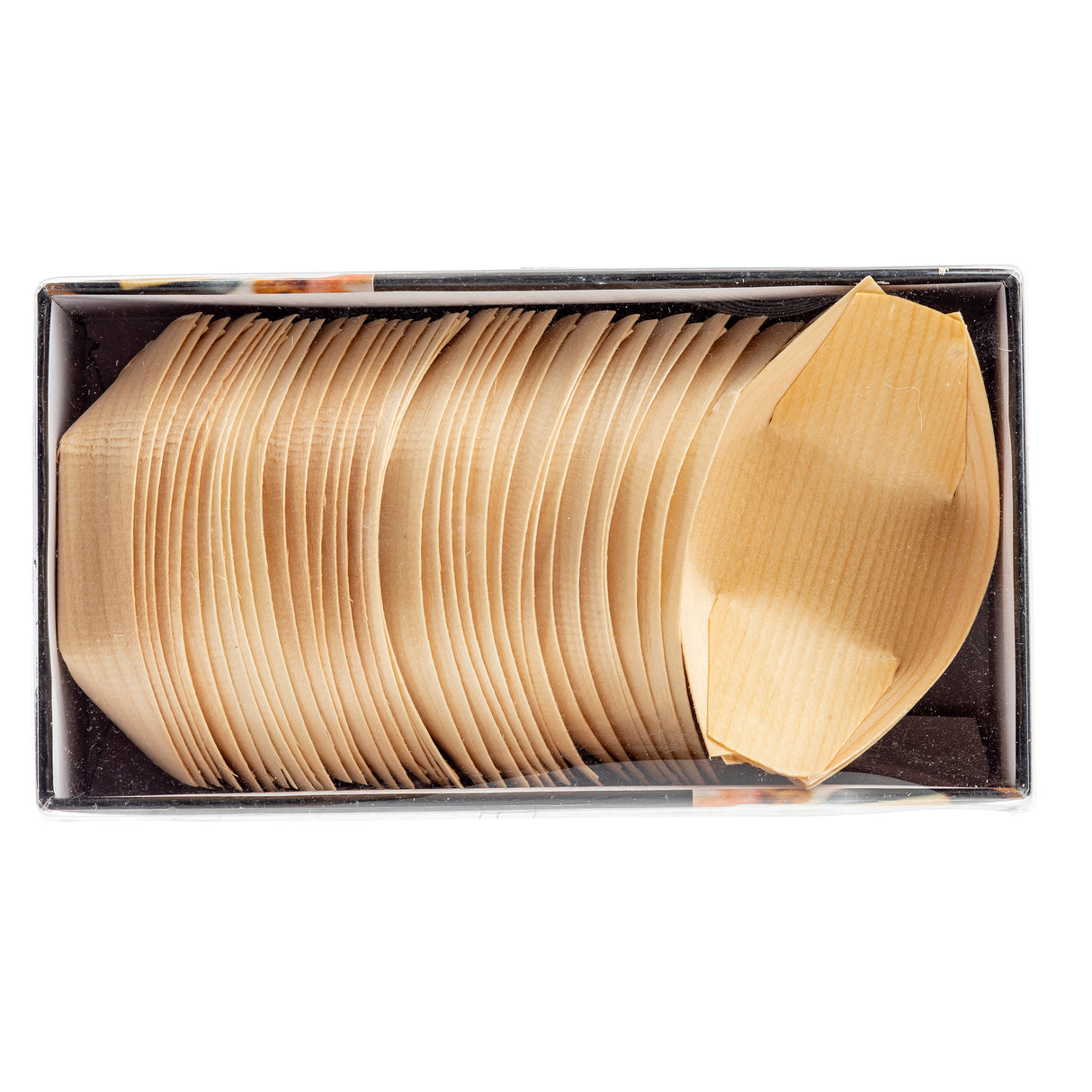 A top-down view of a box filled with neatly stacked, mini boat shaped, light brown biodegradable pinewood plates, with one plate slightly raised above the rest to showcase this eco-friendly disposable serving piece’s smooth texture and unique shape.