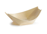 A mini boat-shaped dish made from biodegradable pinewood, featuring gently curved sides and pointed ends with visible wood grain texture, serves as an eco-friendly disposable serving piece on a white background.