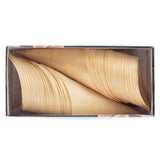 A rectangular box holds two neat stacks of eco-friendly, light-colored disposable serving cones, arranged with tips facing opposite corners. The wood grain is visible, and the biodegradable cones are tightly nested together.