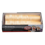 A clear box of stacked, light wood-colored eco-friendly mini serving cups labeled “TableCraft Mini Serving Cup.” The packaging holds 50 biodegradable serving cups, each 1.8 inches in diameter, with serving suggestions pictured on the box.