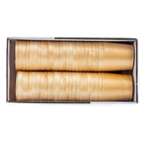 A rectangular box contains two neat rows of eco-friendly mini serving cups stacked horizontally. Each cup is light tan, smooth, and thin, with the edges clearly visible. The white interior of the box highlights their orderly arrangement from above.