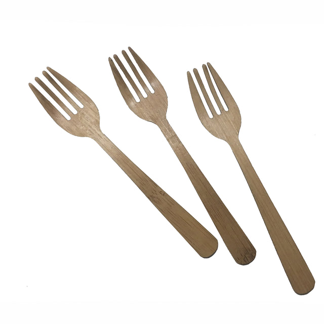 Three light brown eco-friendly disposable forks are arranged side by side on a white background. Each biodegradable bamboo fork has four prongs and a flat handle, showcasing a simple, natural grain pattern with handles pointing downward.