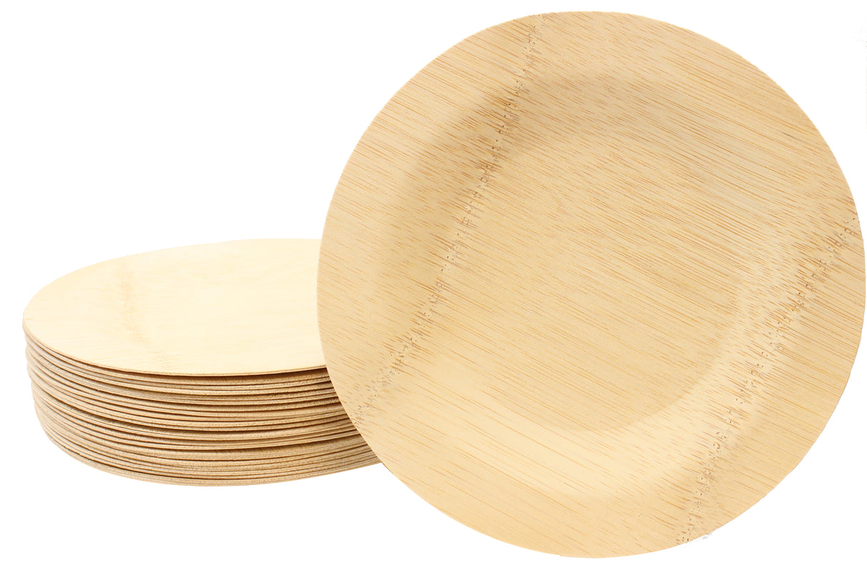 A stack of round, light-colored TableCraft disposable bamboo plates is shown. One 11 inch plate is propped upright in front, highlighting its smooth surface, visible natural grain patterns, and eco-friendly, biodegradable design.