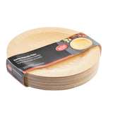A stack of round, light-colored TableCraft 9 inch disposable bamboo plates is shown. Packaged with a black and red paper band featuring product details and a plate of vegetables, the plates display a natural, smooth texture.