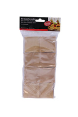 A clear plastic package contains six small, bamboo-colored square serving dishes. The TableCraft label on top reads “Mini Square Serving Dish” in English, Spanish, and French, with a photo of food skewers on these disposable dishes.