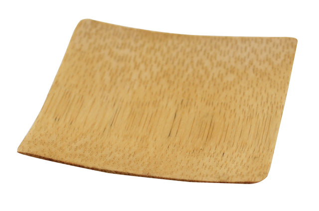 A small, square, shallow disposable dish made of light-colored bamboo with a natural wood grain texture. The edges are slightly curved upward and the surface is smooth. The empty TableCraft plate is photographed against a white background.