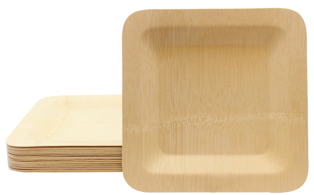 A stack of square, eco-friendly TableCraft Products disposable bamboo plates with rounded corners is shown. One square plate stands upright at the front, displaying its shallow, gently indented center and natural wood grain pattern.