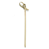 A single bamboo knot pick by TableCraft, light tan with a pointed end and a flat, decorative loop at the top. It rests vertically on a plain white background, displaying its stylish knotted detail.