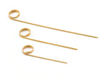 Three TableCraft bamboo cocktail picks with pointed tips and decorative loops at one end are arranged on a white background. The picks, perfect as card holder picks, are parallel in three different lengths, from shortest to longest.