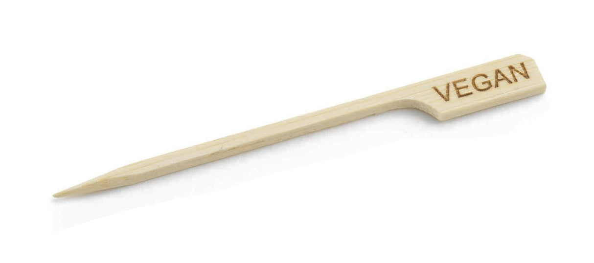 A bamboo Vegan Pick by TableCraft, featuring a pointed end and flat handle. "VEGAN" is engraved in bold capitals on the handle, perfect for labeling plant-based options. The background is plain white.