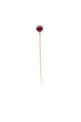 A bamboo sport pick with a dark red, round bead featuring a black line detail on top. The toothpick stands upright against a plain white background, with the bead resembling a small olive or basketball decoration.