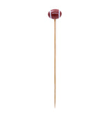 A bamboo football pick, known as the TableCraft Products Cash & Carry Sport Pick, features a small brown football with white laces atop a wooden cocktail pick, standing vertically against a plain white background.