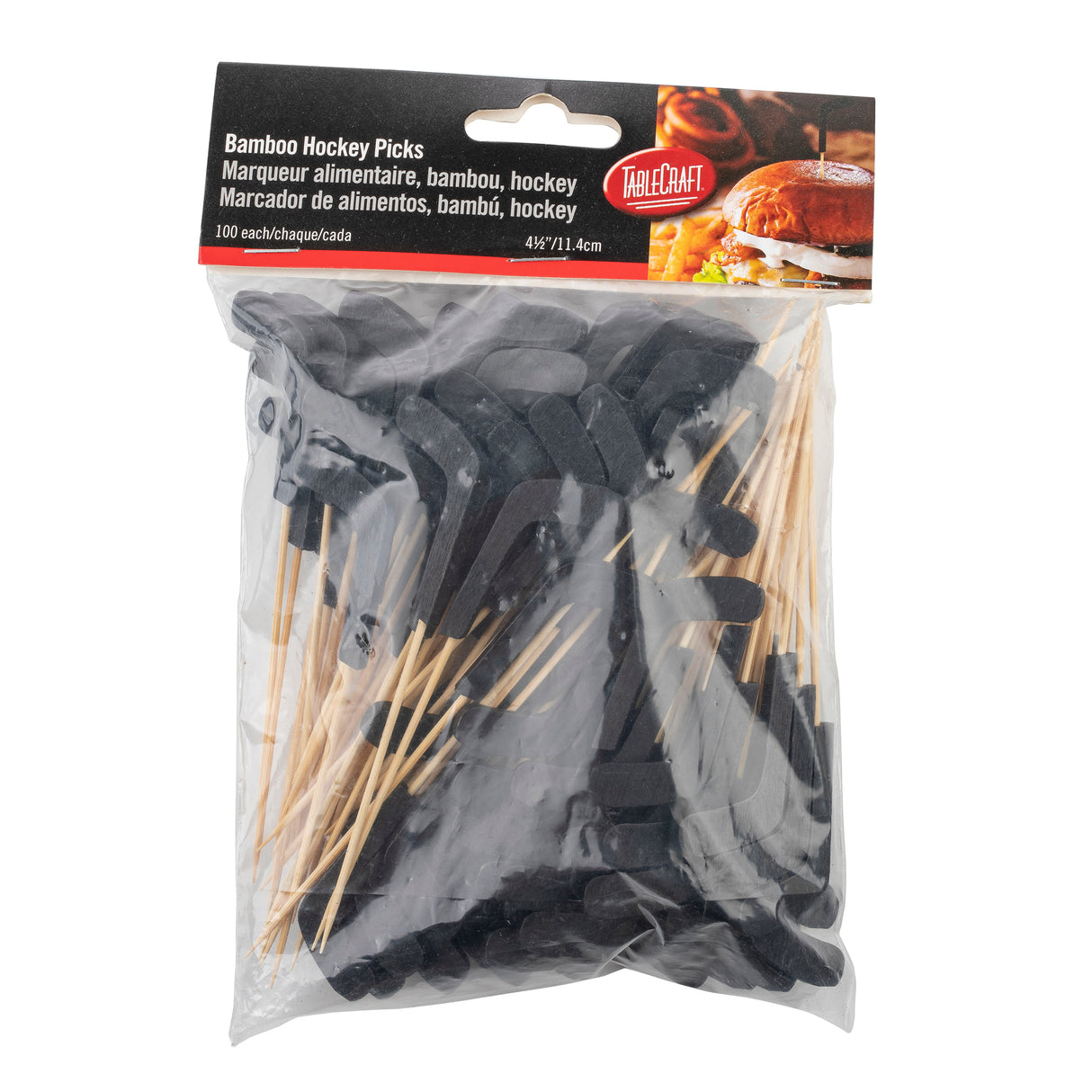 A clear plastic bag contains 100 bamboo Sport Picks with black, hockey stick-shaped tops. The “Bamboo Hockey Picks” label appears in English, French, and Spanish alongside the TableCraft logo and a sandwich image.