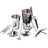 A stainless steel cocktail kit includes bar tools like a shaker labeled Essential Cocktail Kit, jigger, ice scoop, bottle opener, corkscrew, strainer, mixing spoon, and slotted spoon—all arranged on a white background.