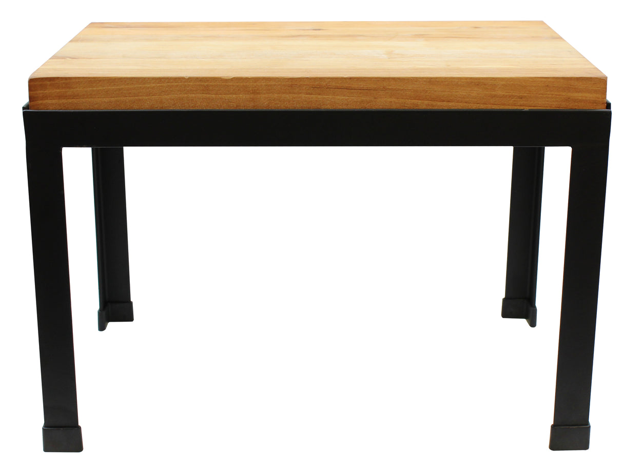 A rectangular table with a thick, light wood butcher block top and sturdy black metal legs. The simple, modern design features clean lines and an industrial style, photographed against a plain white background.