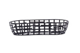 A black powder coated metal, oval-shaped serving basket with an open grid pattern and no handles, shown on a white background. Part of the Complexity Collection, its simple, modern design is ideal for organizing or displaying items.
