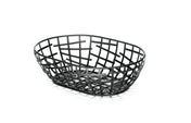A black powder coated metal Serving Basket with an open geometric grid pattern sits on a white background. Part of the Complexity Collection, its interwoven bars create a modern design and cast subtle shadows beneath it.