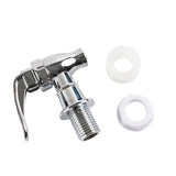 A shiny silver metal spigot replacement faucet with a lever handle is shown beside two white plastic washers on a plain white background. Designed for TableCraft glass beverage dispensers, the spigot features threaded ends for easy attachment.