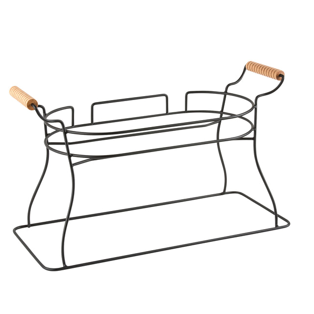 A wire storage basket with a rectangular base and curved sides, featuring two light wood handles on each end. Made from black powder coated metal, its open, minimalist design is perfect for holding towels, bottles, or as a Glass Beverage Dispenser Base.