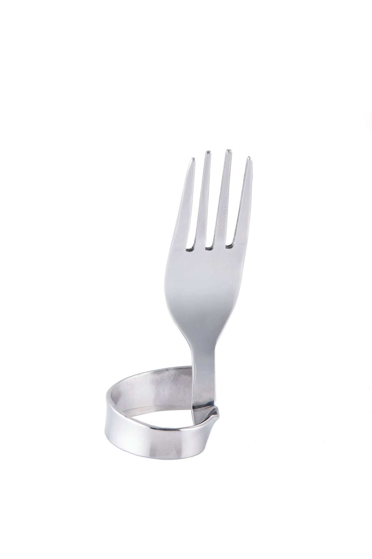 A stainless steel fork is bent so its handle forms a circular loop, allowing it to stand upright as a unique number card holder or fork clip. The prongs point upward, while the handle touches the white surface in an artistic shape.