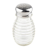 A clear, ribbed TableCraft glass salt shaker with a shiny metal lid featuring small holes for dispensing salt. “STAINLESS” is engraved on the lid. This beehive salt pepper shaker is empty and photographed against a plain white background.