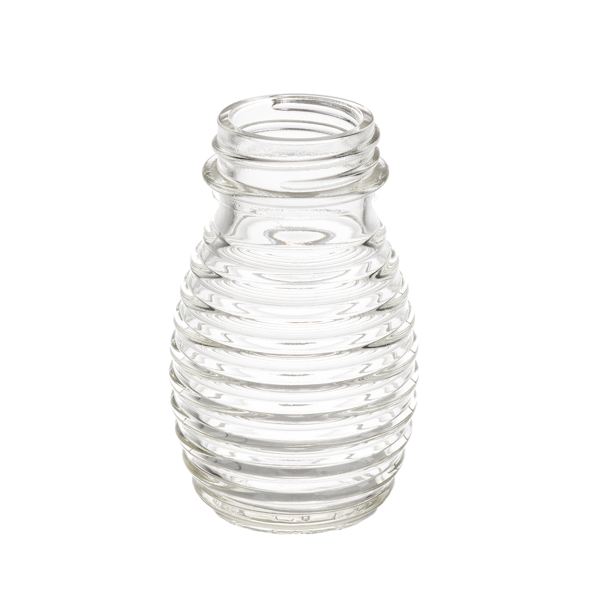 A clear, empty TableCraft glass bottle with a narrow neck and rounded body featuring evenly spaced horizontal ridges for a beehive-like look. Ideal as a replacement shaker for salt and pepper, it stands upright on a white background.