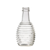 A clear, empty 6 oz glass bottle with a ribbed, beehive-like design, tapered shoulders, and a short neck. Ideal as a replacement jar for oil/vinegar, it stands upright on a white background with no cap or label.