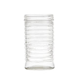 A clear, empty 12 oz glass jar with a series of evenly spaced horizontal ridges around its body, giving it a ribbed, beehive shakers-inspired texture. The jar stands upright on a white background and has a wide opening at the top.