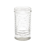 A clear, empty 12 oz glass jar stands upright on a white background. The jar has a cylindrical shape with horizontal ridges wrapping around its body, resembling beehive shakers, and the top is open with smooth, transparent glass.