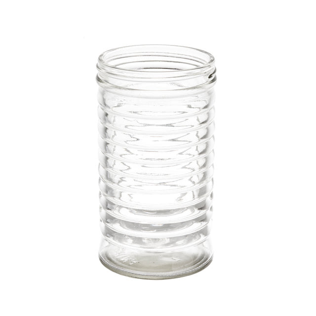 A clear, empty 12 oz glass jar stands upright on a white background. The jar has a cylindrical shape with horizontal ridges wrapping around its body, resembling beehive shakers, and the top is open with smooth, transparent glass.