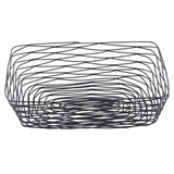 A rectangular serving basket from the Artisan Collection, this black powder coated metal basket features thin rods in a crisscross pattern, creating a geometric, airy look. The intersecting wires give it a modern, minimalist design. The basket is empty.