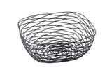 The TableCraft BK17310 Artisan Collection Basket features a black powder coated metal basket with an open, crisscross pattern and rounded, irregular shape, creating a lightweight, airy look. Photographed against a white background.