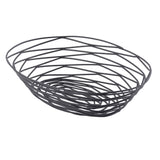 A modern, oval-shaped Artisan Collection Basket from TableCraft, crafted from black powder coated metal. Its open, airy design features interwoven wires arranged irregularly for a lightweight, minimalist look that widens gracefully toward the top.